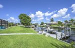 Backyard with Fantastic Canal View and Boat Dock with Lift